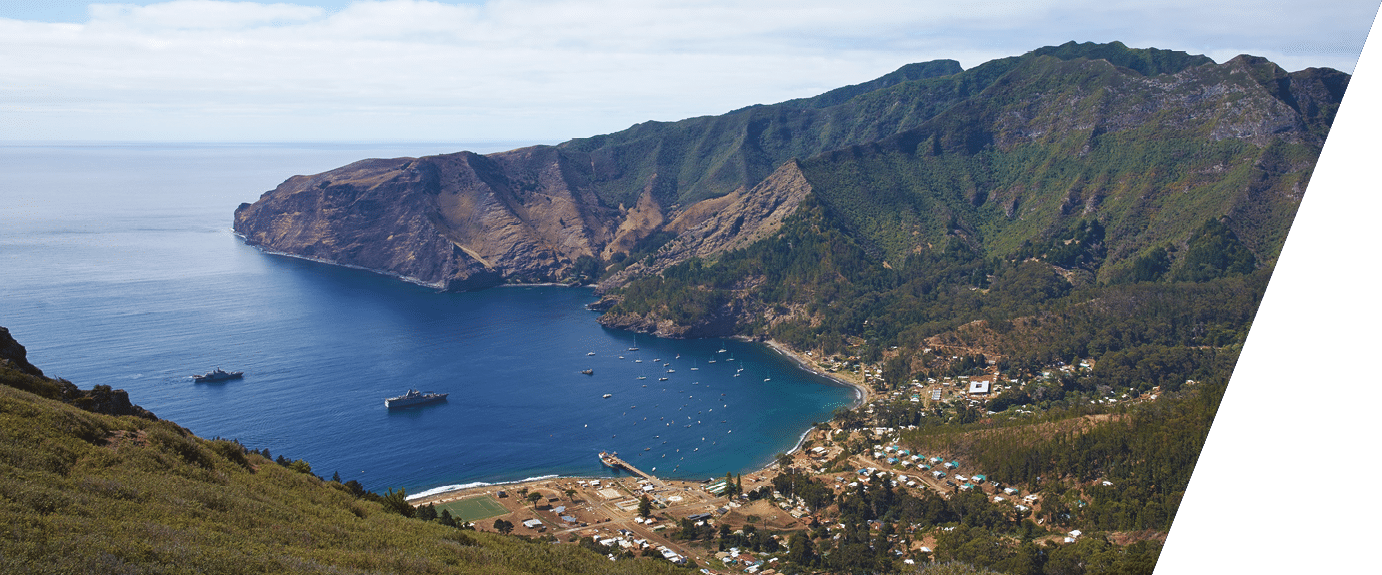 Panoramic view of Cumberland Bay and the town of San Juan Bautista on Robinson Crusoe Island, one of three main islands making up the Juan Fernandez Islands some 400 miles off the coast of Chile